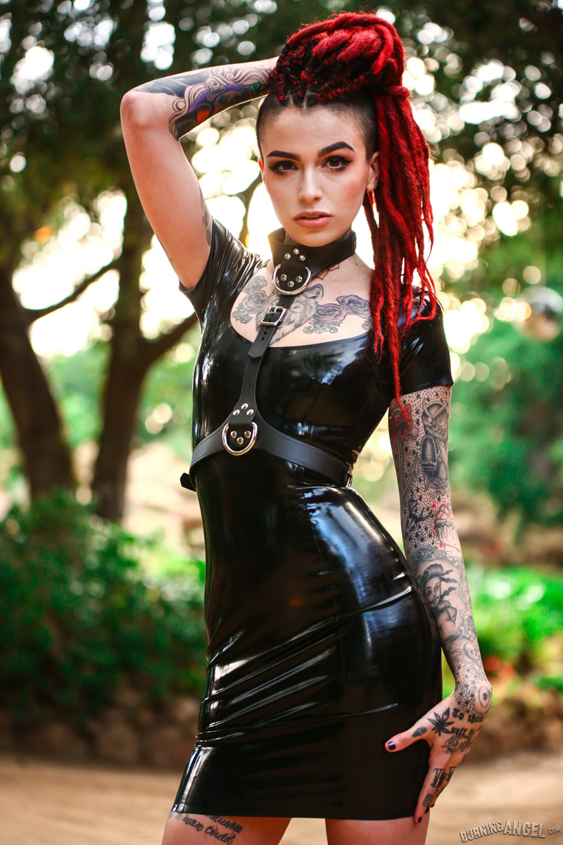 Leigh Raven peels off her skintight shiny latex dress