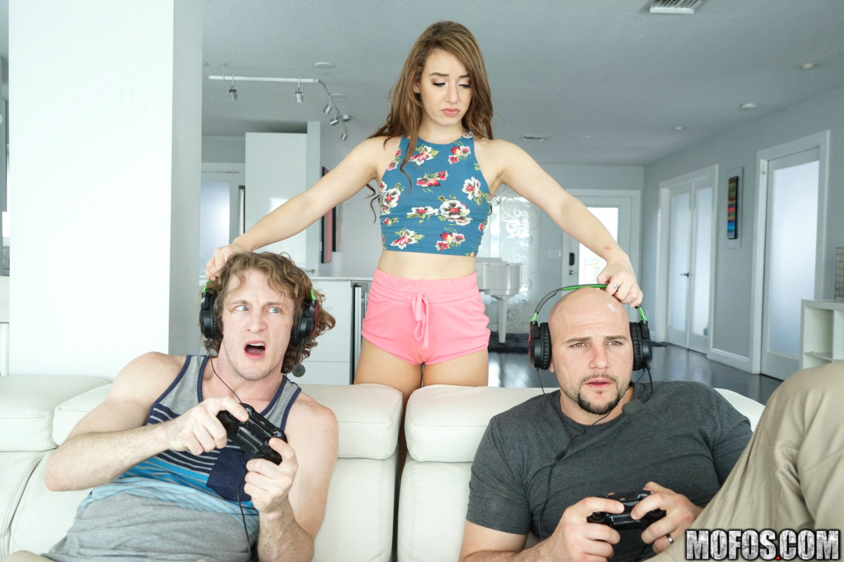 Harley Ann Wolf gets her pussy poked by two gamers