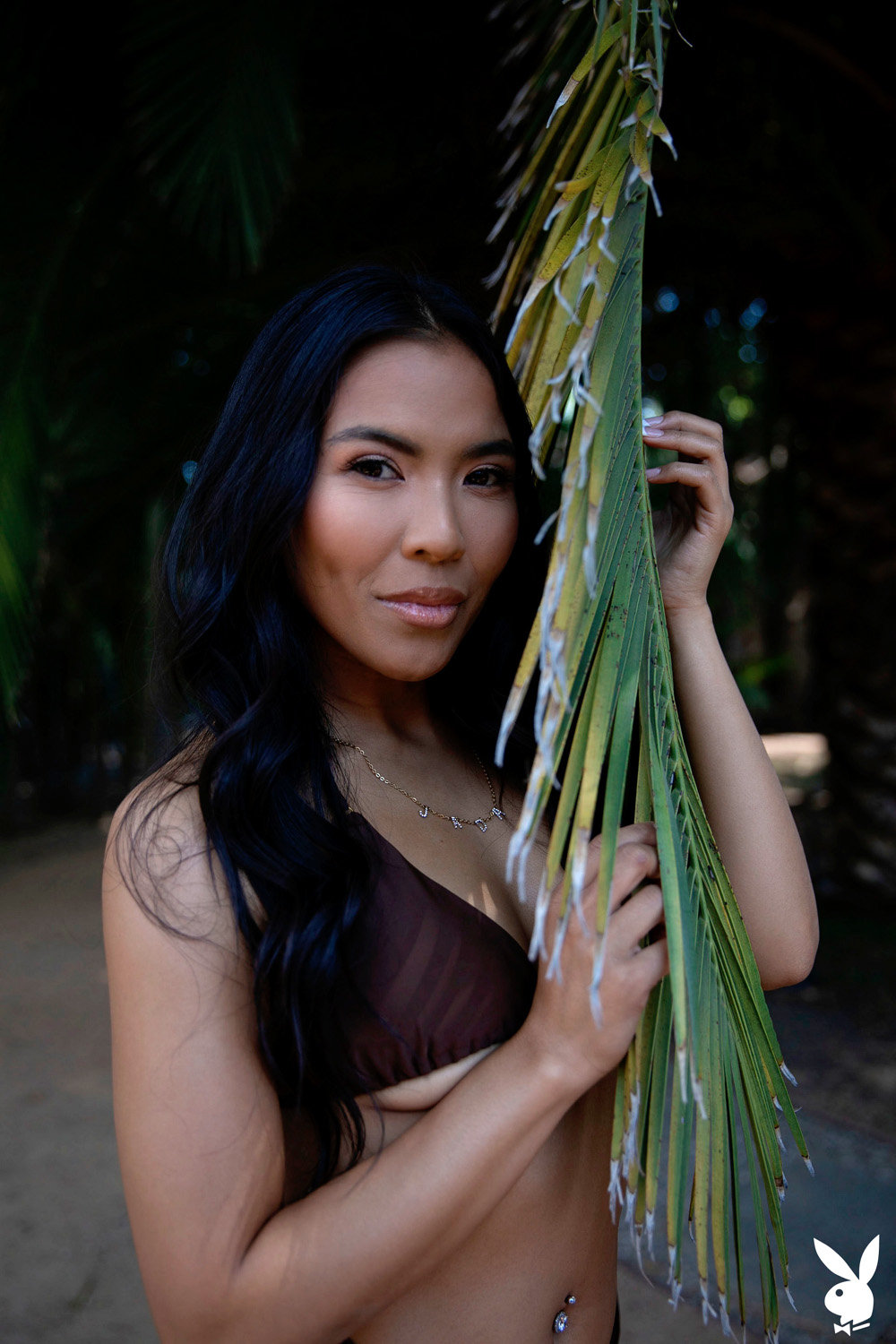 Jada Kai exposes her sexy curves surrounded by palm trees