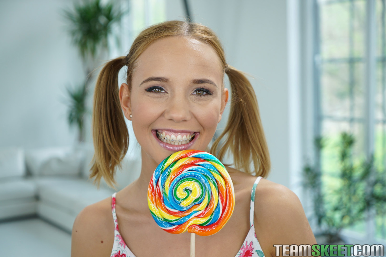 Poppy Pleasure licks a sweet lollipop then devours a tasty cock