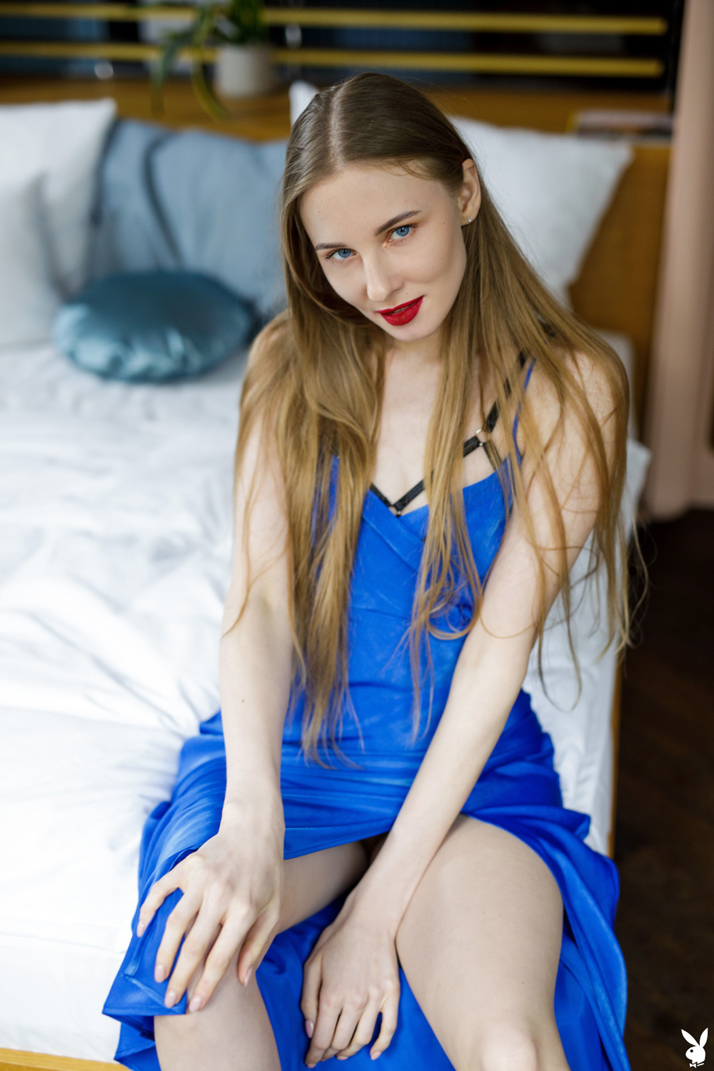 Stella seduces in a royal blue dress and kinky black lingerie